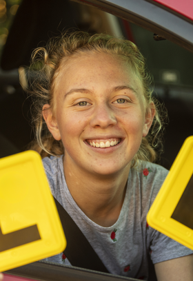 Teenage-Girl-Celebrating-Learning-to-Drive-Landing-Image.png